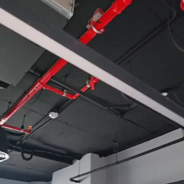 Red fire pipes and ceiling services on site